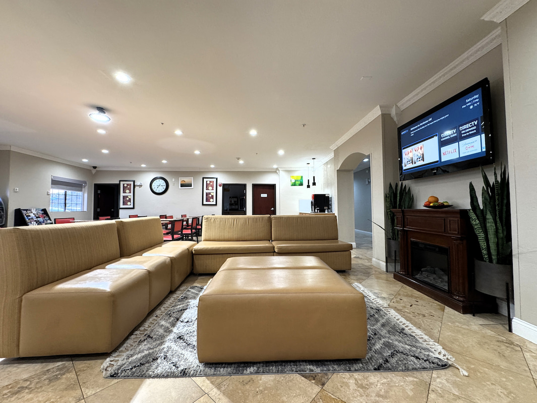 Lobby coffee station and sofa area at Quality Inn & Suites McAlester on Hwy 69