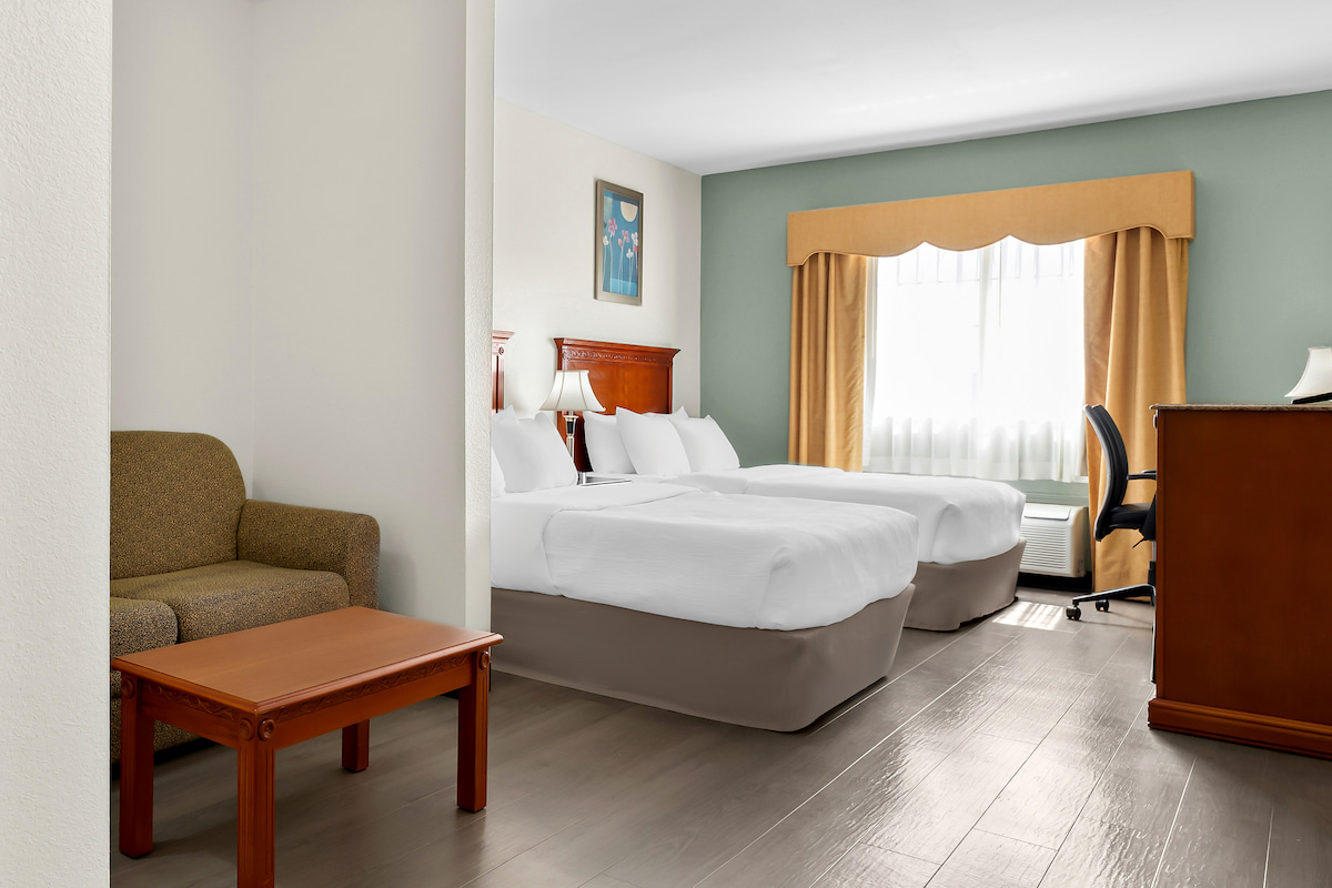 Double queen room with sofa at Quality Inn & Suites McAlester on Hwy 69